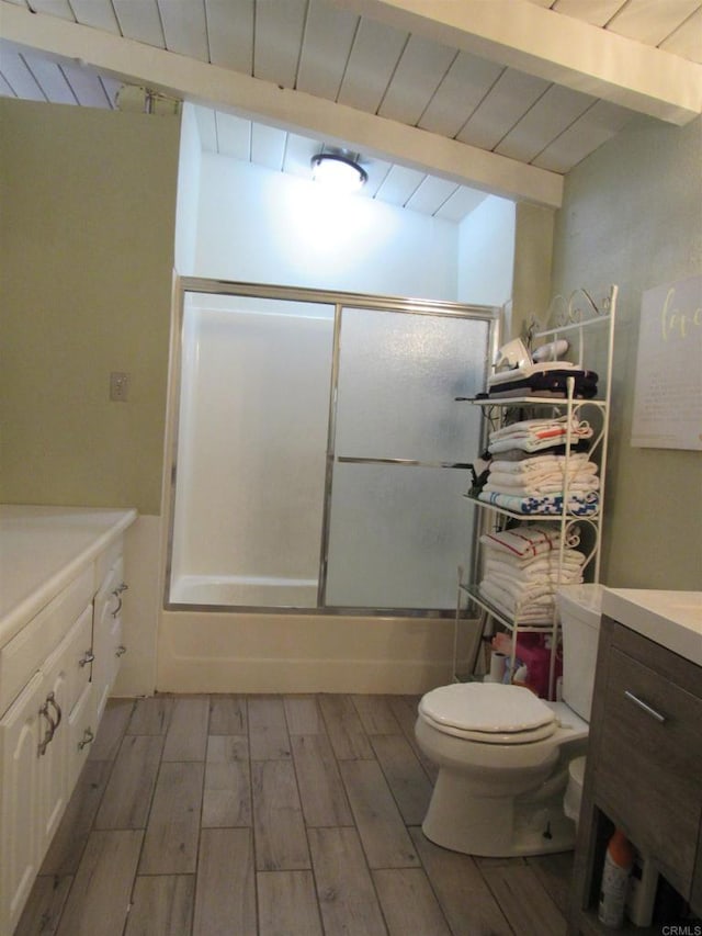 full bathroom with hardwood / wood-style floors, vaulted ceiling with beams, wooden ceiling, and vanity