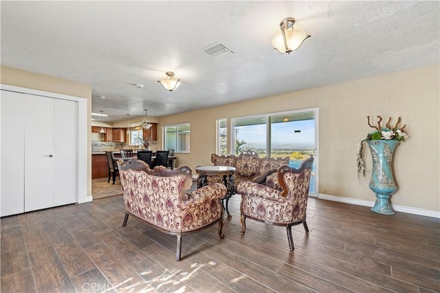 living room featuring dark hardwood / wood-style flooring