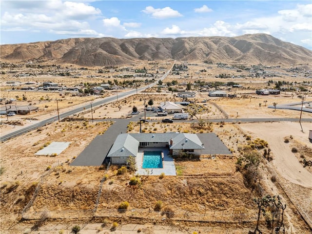 bird's eye view with a mountain view