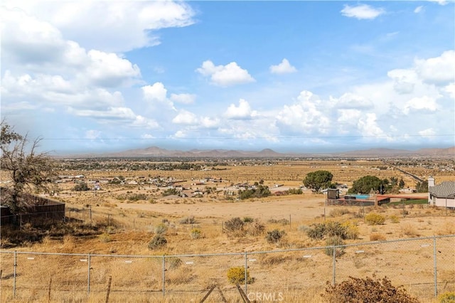 mountain view featuring a rural view