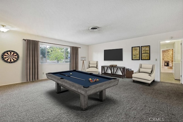 game room featuring carpet floors, a textured ceiling, and billiards