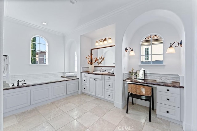 bathroom with tile patterned flooring, vanity, ornamental molding, and tasteful backsplash