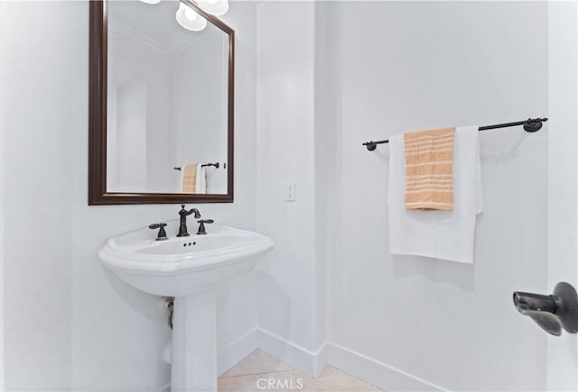 bathroom with tile patterned floors