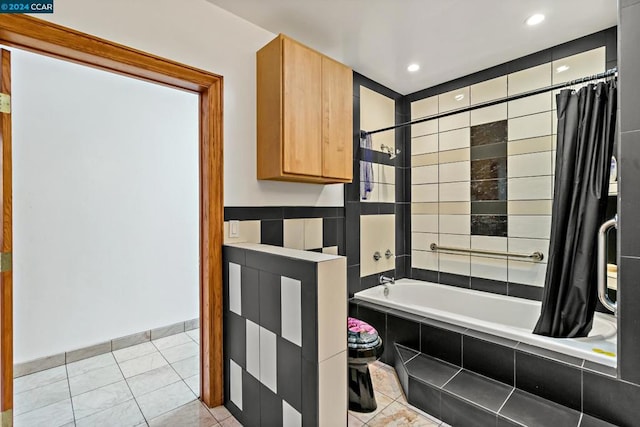 bathroom with tile patterned flooring, shower / bath combination with curtain, and toilet