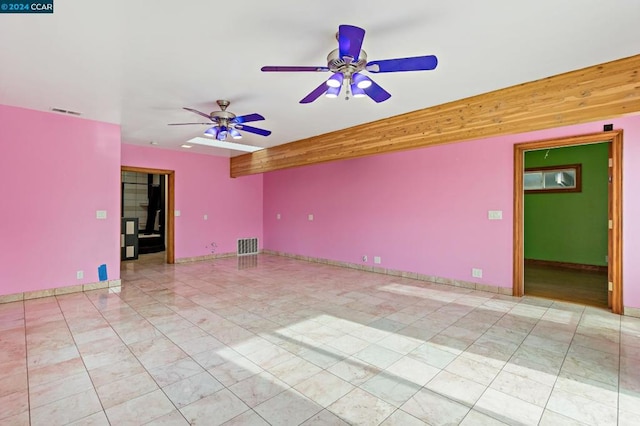 spare room featuring ceiling fan