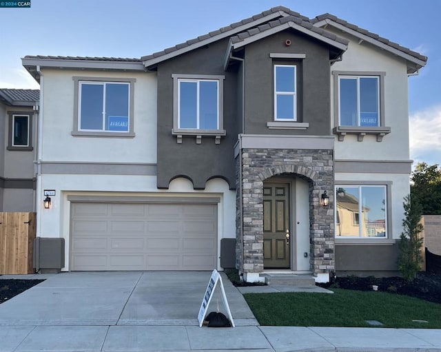 view of front of home featuring a garage