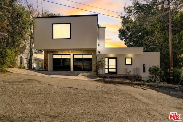 contemporary house featuring a garage