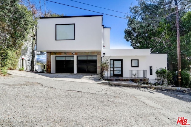 contemporary home with a garage