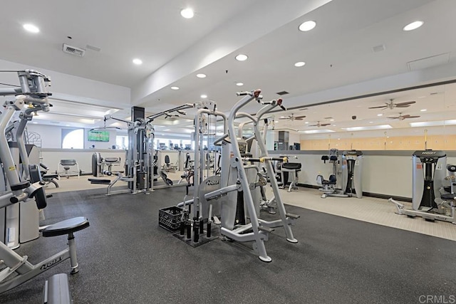 exercise room featuring ceiling fan