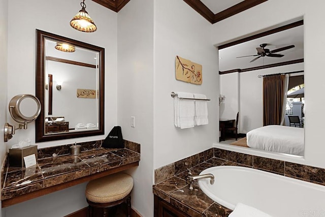 bathroom featuring a relaxing tiled tub, ornamental molding, and ceiling fan