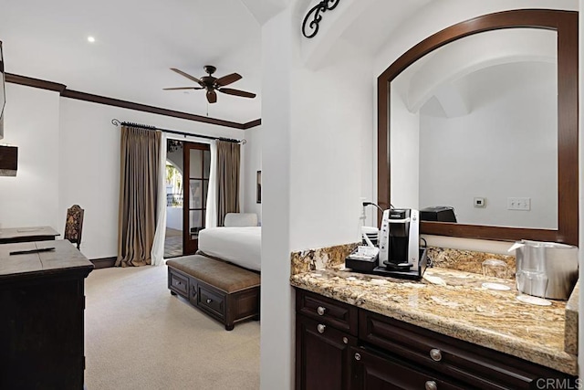 carpeted bedroom featuring crown molding, access to outside, and ceiling fan