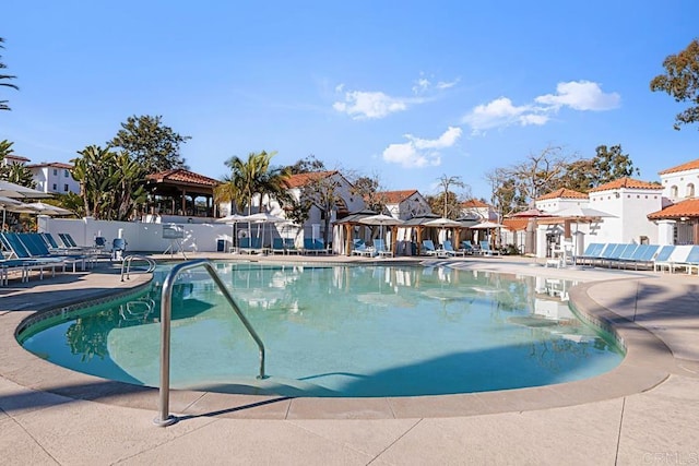 view of pool with a gazebo and a patio area