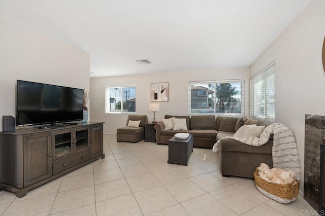 living room with light tile patterned floors