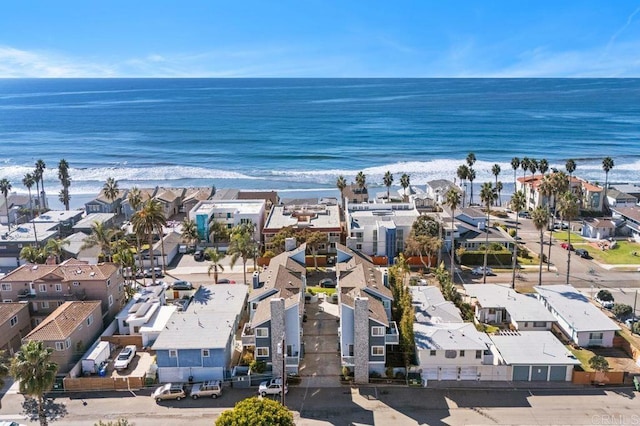 aerial view featuring a beach view and a water view