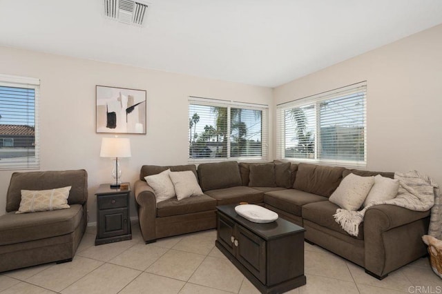 living room with light tile patterned floors