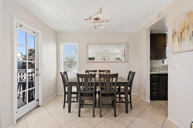 dining room with light tile patterned flooring