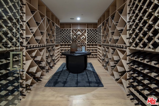 wine area featuring light hardwood / wood-style floors