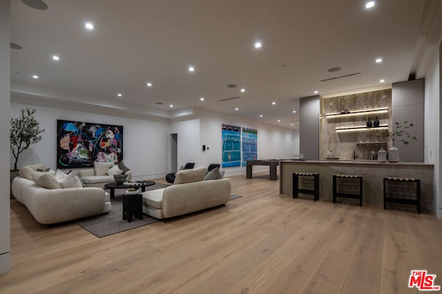 living room with light hardwood / wood-style floors