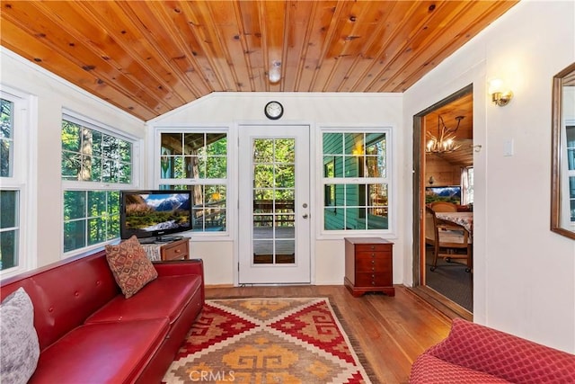 sunroom / solarium with vaulted ceiling and wooden ceiling