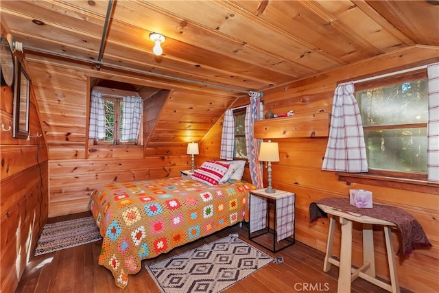 bedroom featuring wood ceiling, wood walls, wood-type flooring, and lofted ceiling