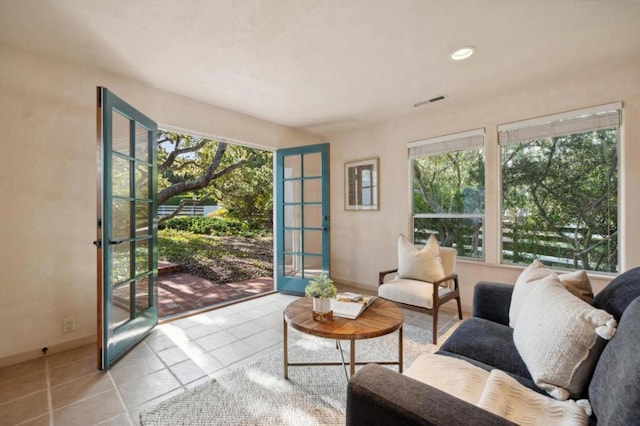 tiled living room with french doors