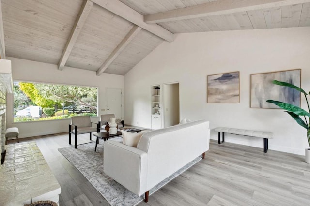 living room featuring beam ceiling, high vaulted ceiling, light hardwood / wood-style flooring, and wooden ceiling