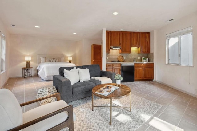 bedroom featuring light tile patterned flooring