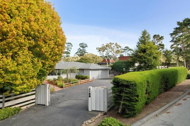 single story home featuring a garage