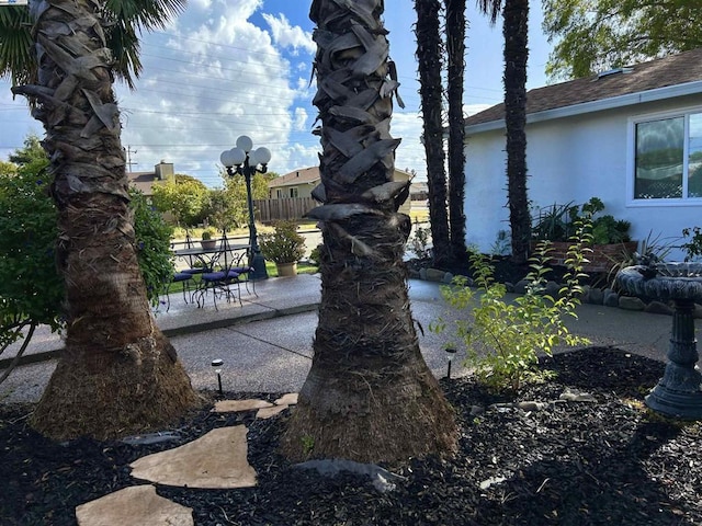 surrounding community featuring a patio