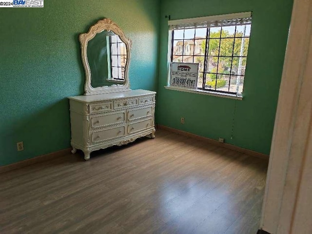 bedroom featuring light wood-type flooring