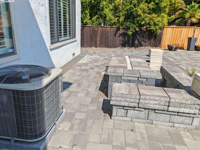 view of patio / terrace with central air condition unit