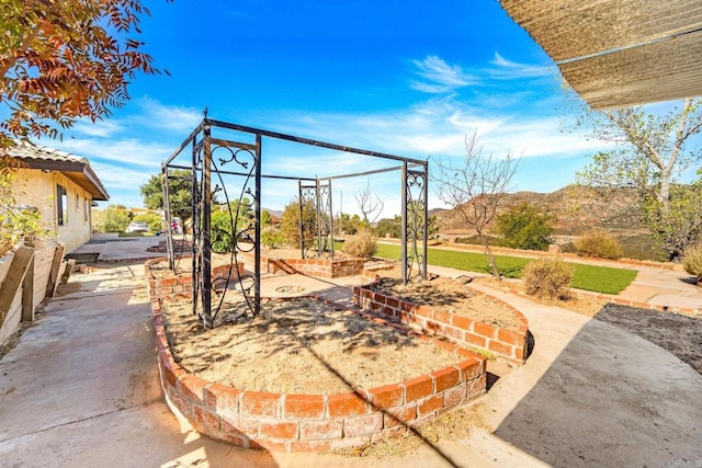 view of patio with a mountain view