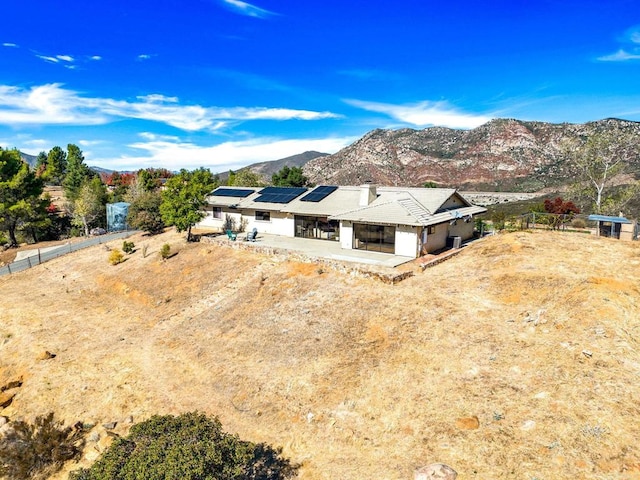 exterior space featuring a mountain view