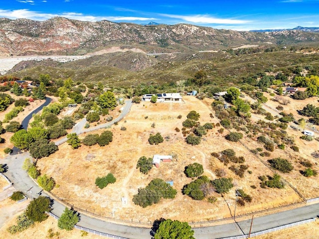 drone / aerial view featuring a mountain view