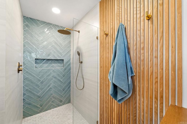 bathroom featuring tiled shower