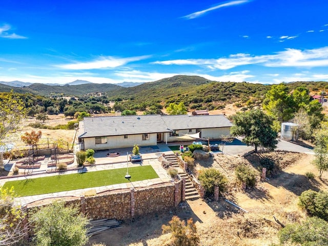 exterior space featuring a mountain view