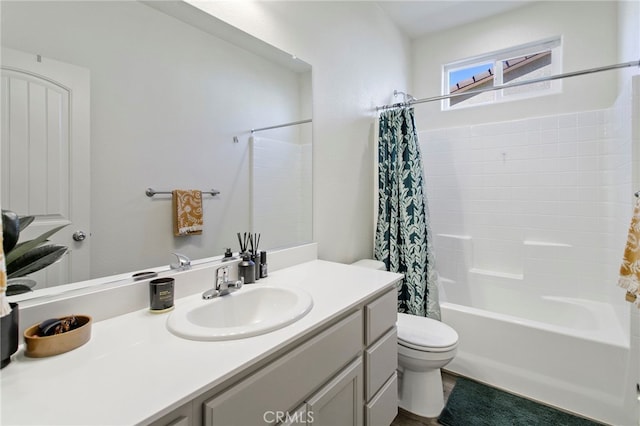 full bathroom with vanity, toilet, and shower / bath combo with shower curtain