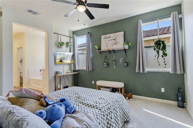 carpeted bedroom with ceiling fan