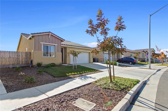 single story home featuring a garage