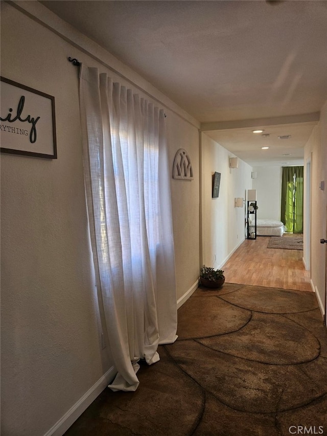 hallway featuring light hardwood / wood-style flooring