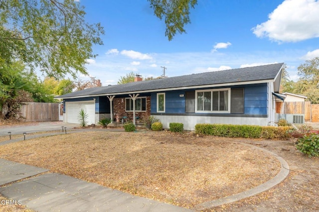 single story home with a porch, a garage, and cooling unit