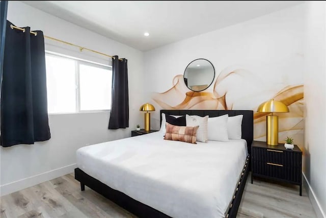 bedroom featuring hardwood / wood-style flooring