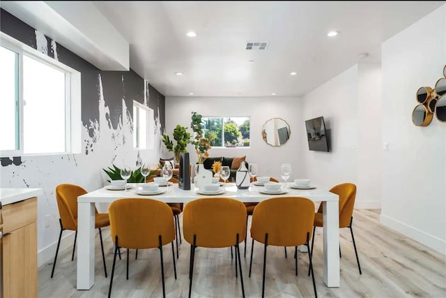 dining area featuring light hardwood / wood-style floors