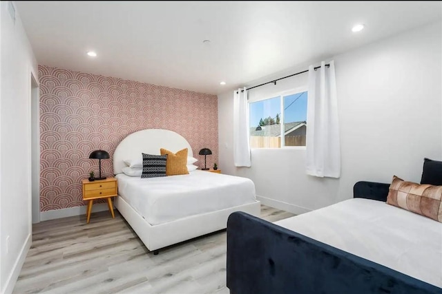 bedroom featuring light hardwood / wood-style floors