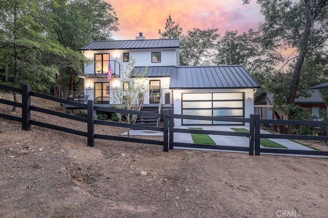 modern farmhouse style home with a balcony