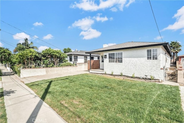 exterior space featuring a front lawn