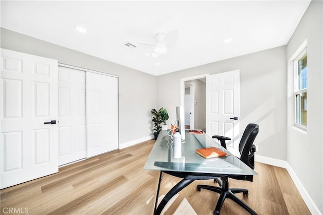 office featuring ceiling fan and light wood-type flooring