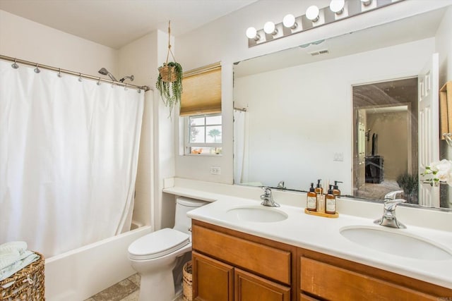 full bathroom with tile patterned floors, vanity, shower / bath combination with curtain, and toilet