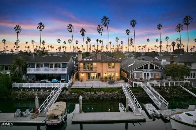 view of dock with a balcony