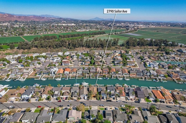 aerial view with a water and mountain view